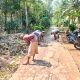 Babinsa Koramil 1507/Luragung bersama warga membersihkan jalan gang Desa Cileuya
